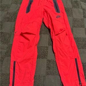 Nike Bright Red Track Pants with Black Details
